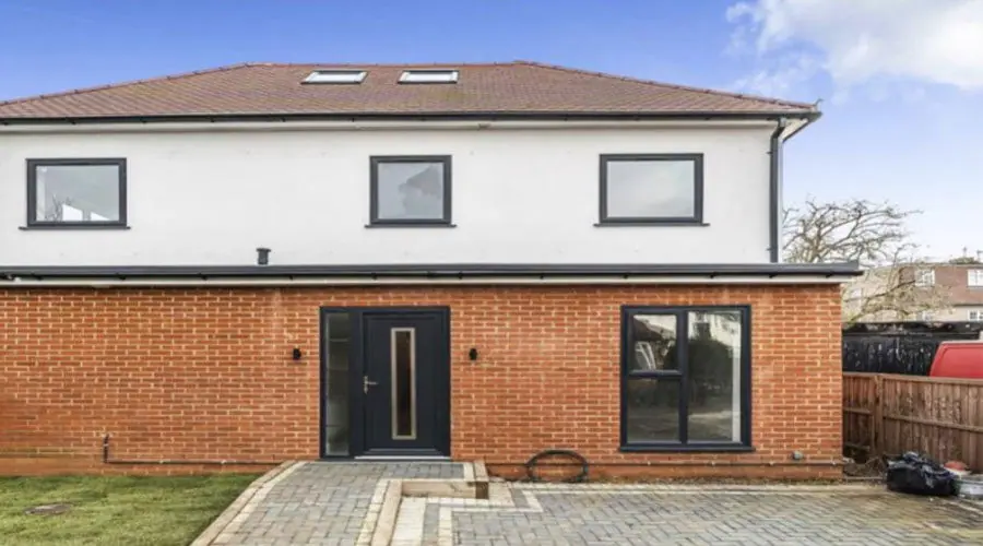 Refurbished two-storey brick and render house